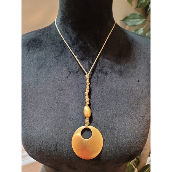 Women's Gold Circle Pendant Necklace with Braided Cord and Unique Bead Design - Picture 2 of 5